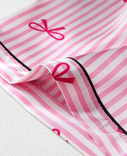 Pijama pink moños rosas