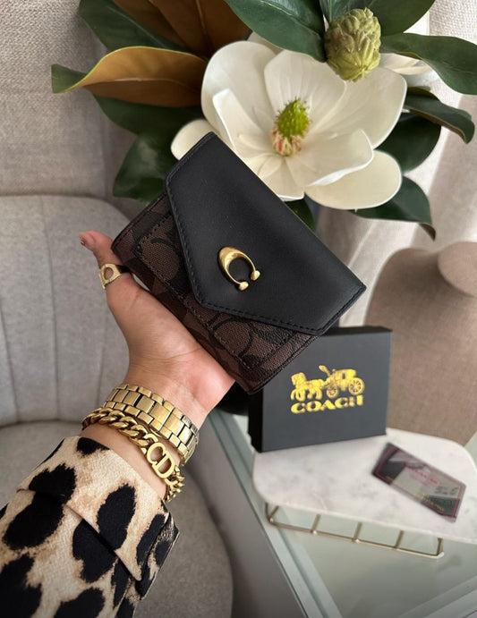 Cartera coach 🍒